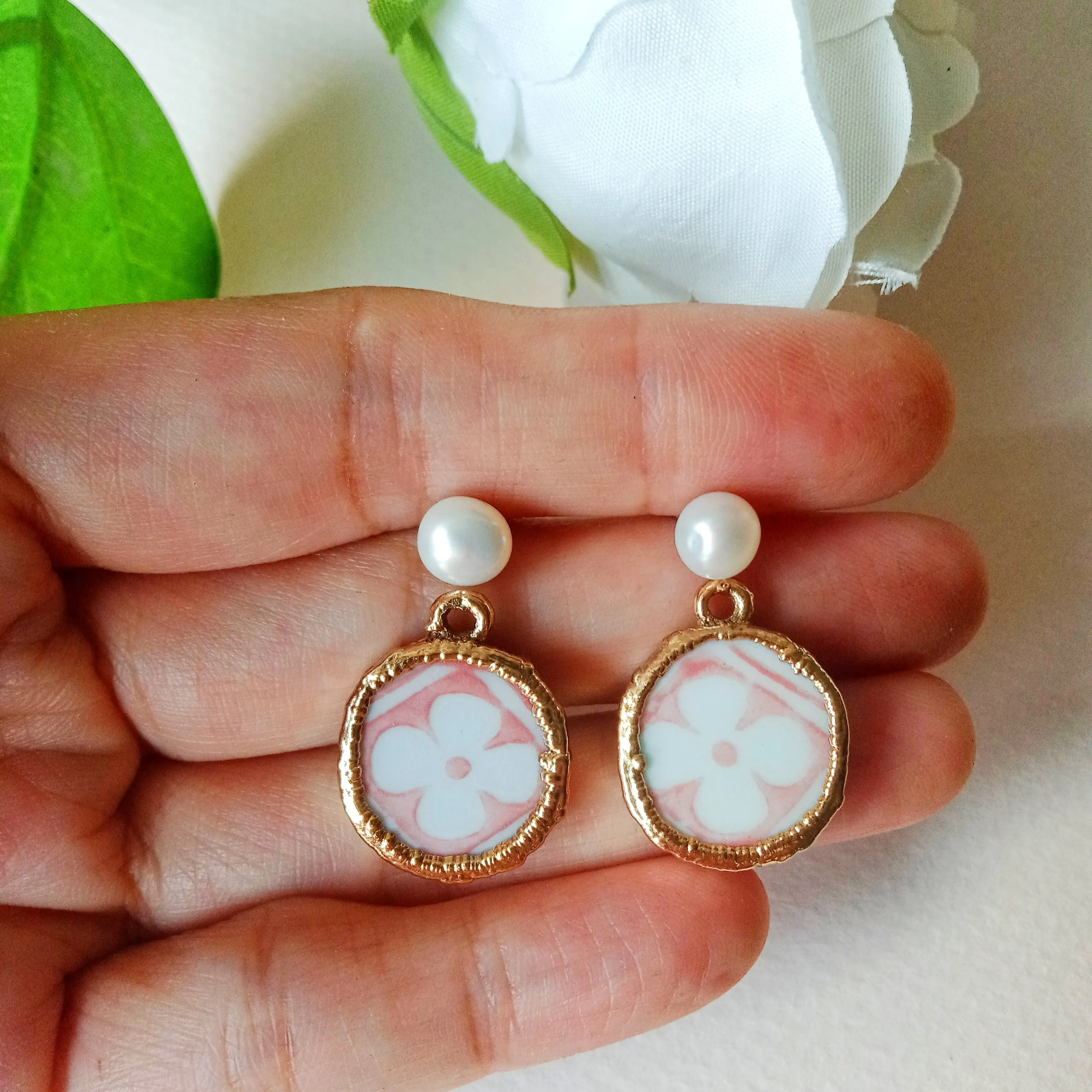 Petite pink stylized flower tile design porcelain earrings